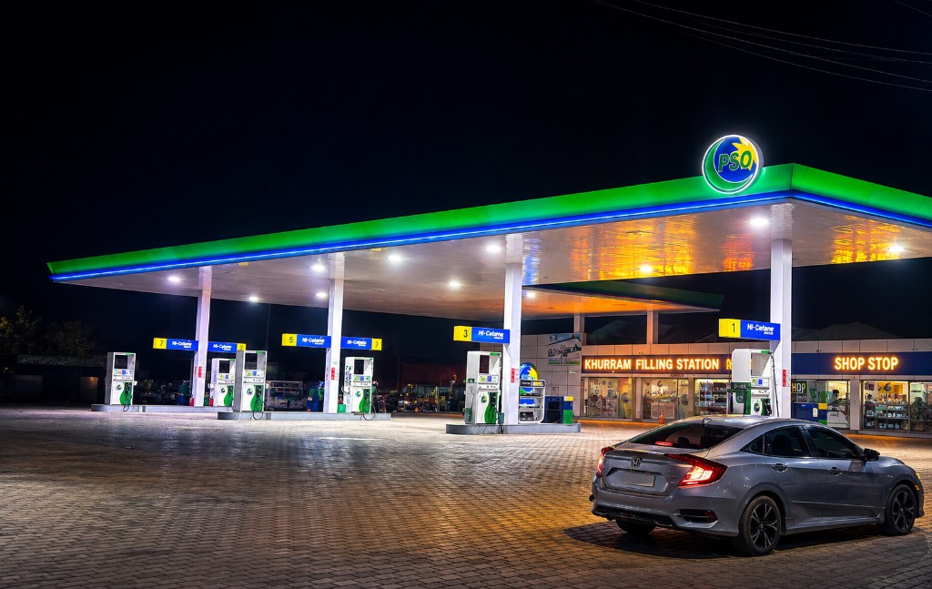 Khurram Filling Station PSO pumps and Shop Stop at night on Sialkot Bypass, Gujranwala